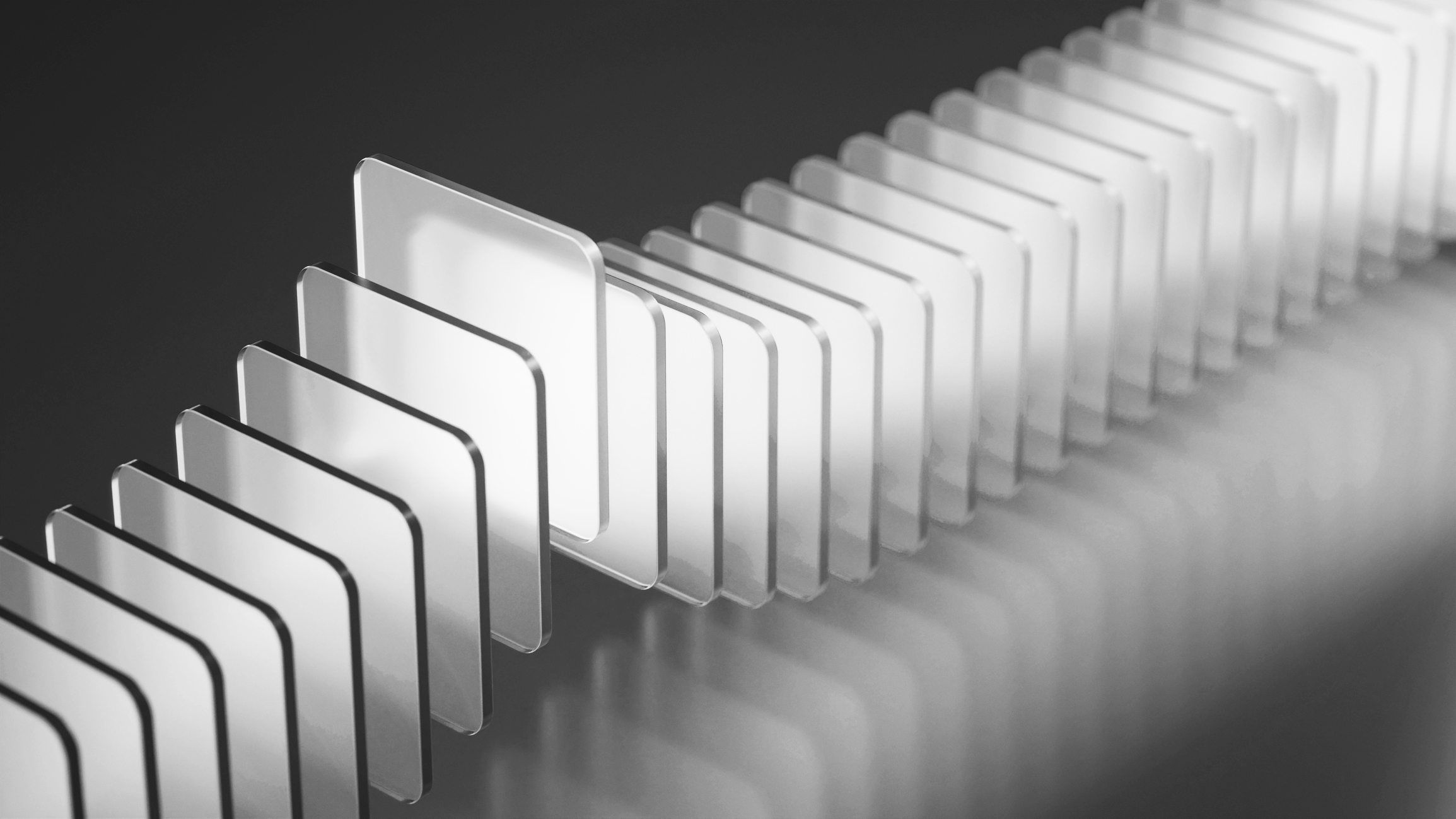 Abstract row of translucent layered rectangular panels receding into mist on a dark background